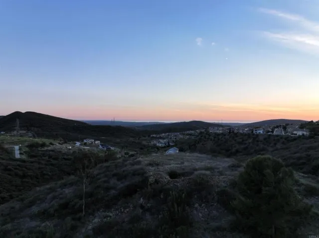 a view of a house with a mountain