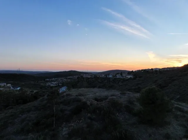 a view of a house with a mountain