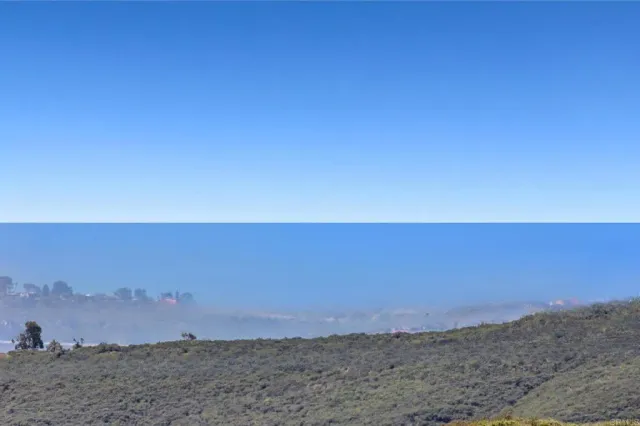 a view of city and mountain