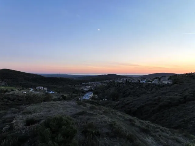 a view of a large garden with an empty space