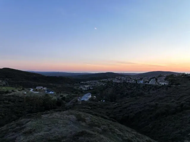a view of a street with a houses