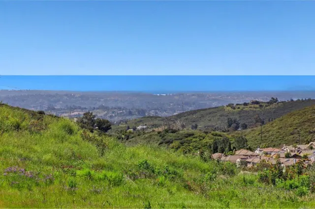 a view of an lake with mountains in the background