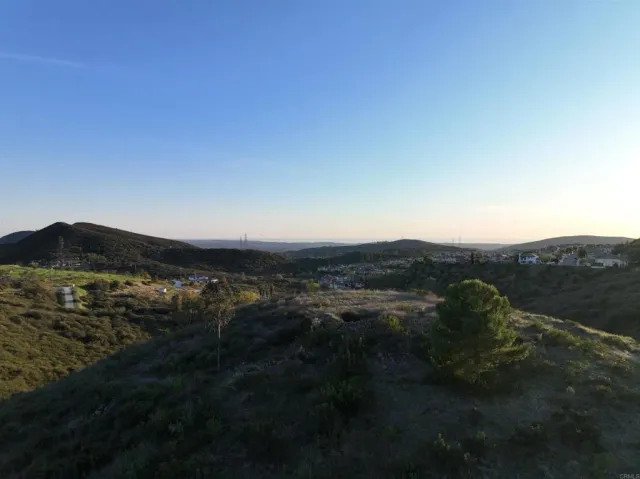 a view of mountain with lake view
