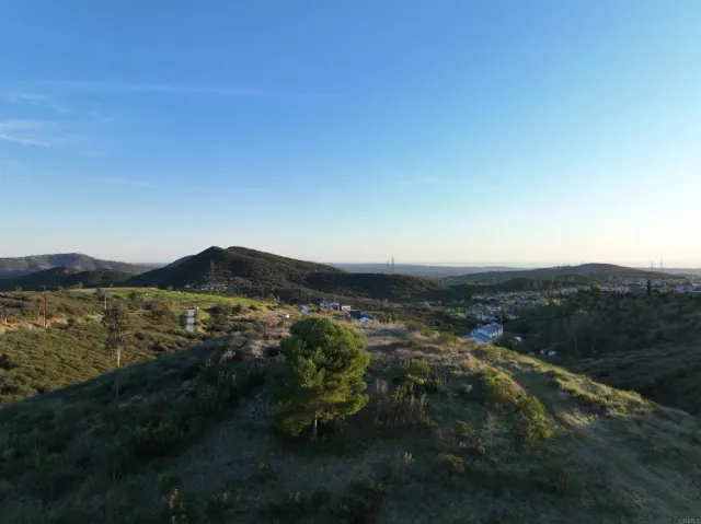 a view of a house with a mountain