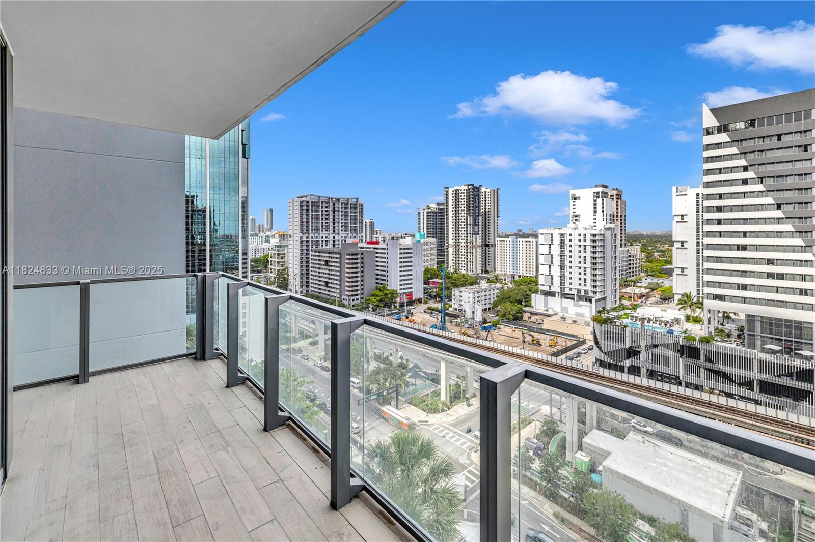 88 Southwest 7th Street, Unit 1006 Miami, FL 33130 - Photo 12 of 24 a view of a city from a balcony with city view