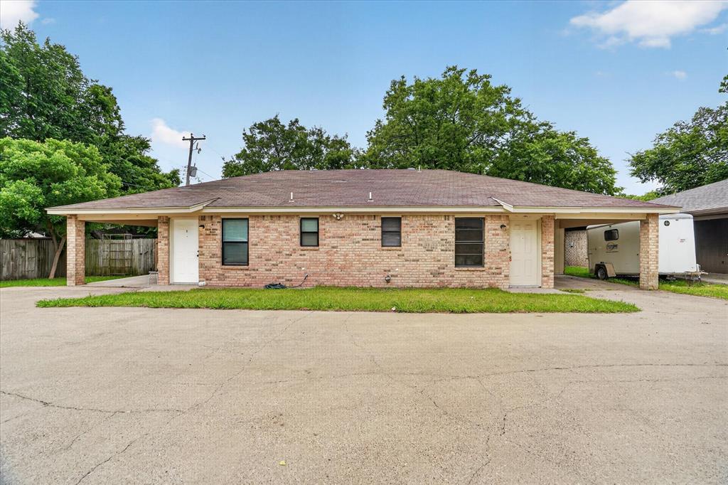 119 Del Rio Avenue, Unit C Benbrook, TX 76126 - Photo 1 of 17 front view of a house with a yard
