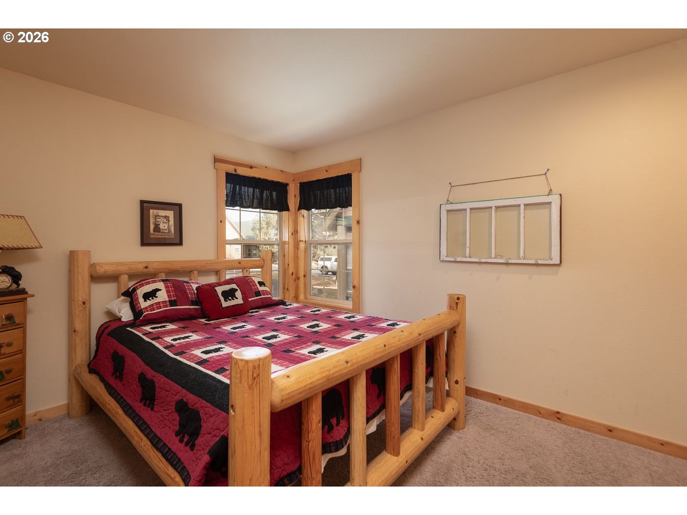 8968 Cliff Swallow Drive Redmond, OR 97756 - Photo 18 of 25 a bedroom with bed and a window