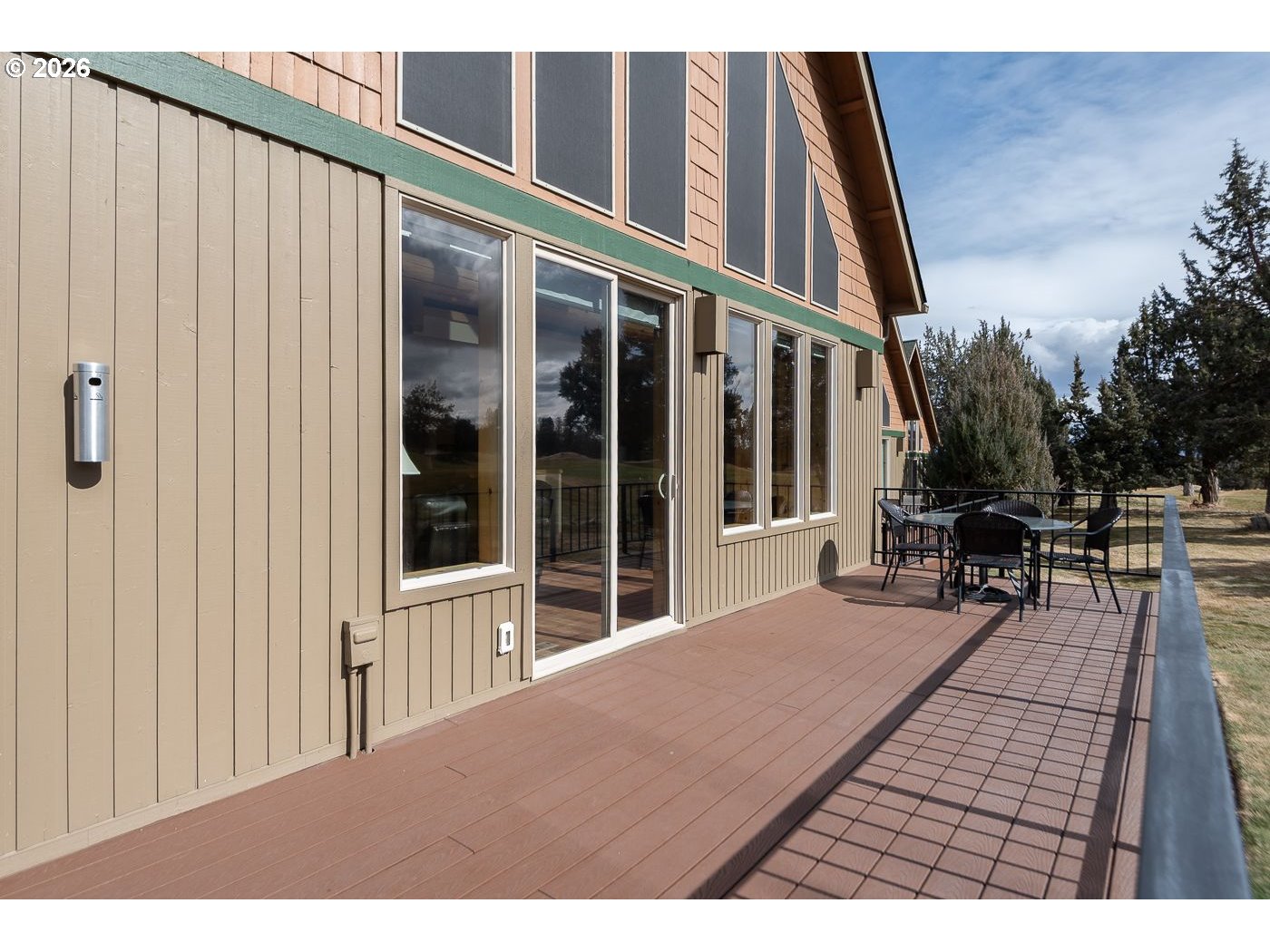 8968 Cliff Swallow Drive Redmond, OR 97756 - Photo 19 of 25 a balcony with table and chairs
