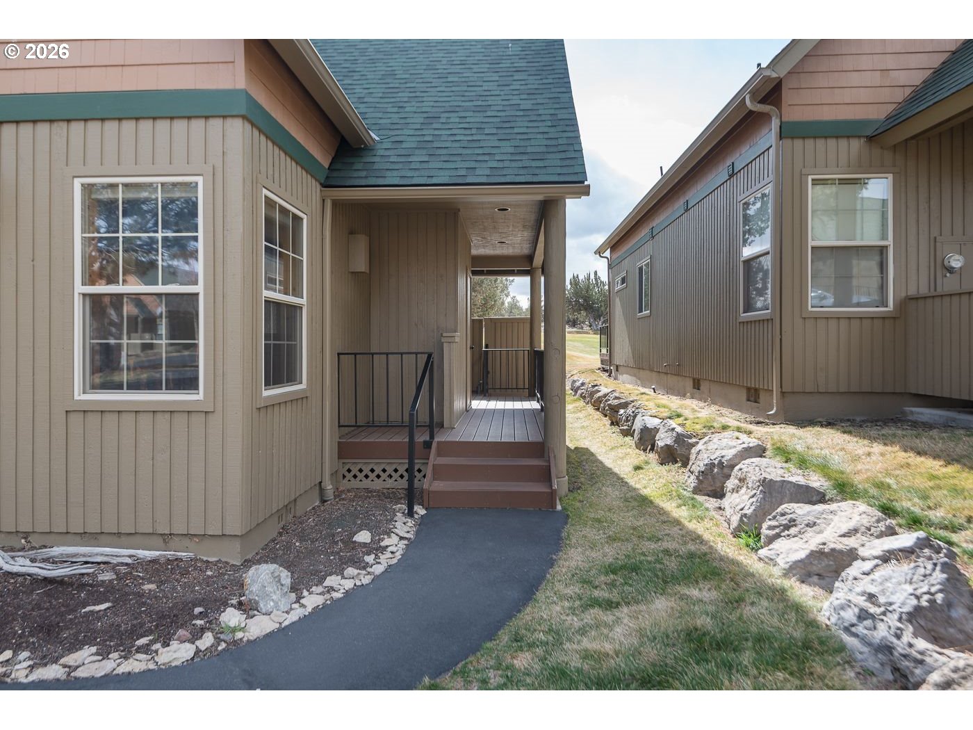 8968 Cliff Swallow Drive Redmond, OR 97756 - Photo 2 of 25 a view of a house with wooden floor