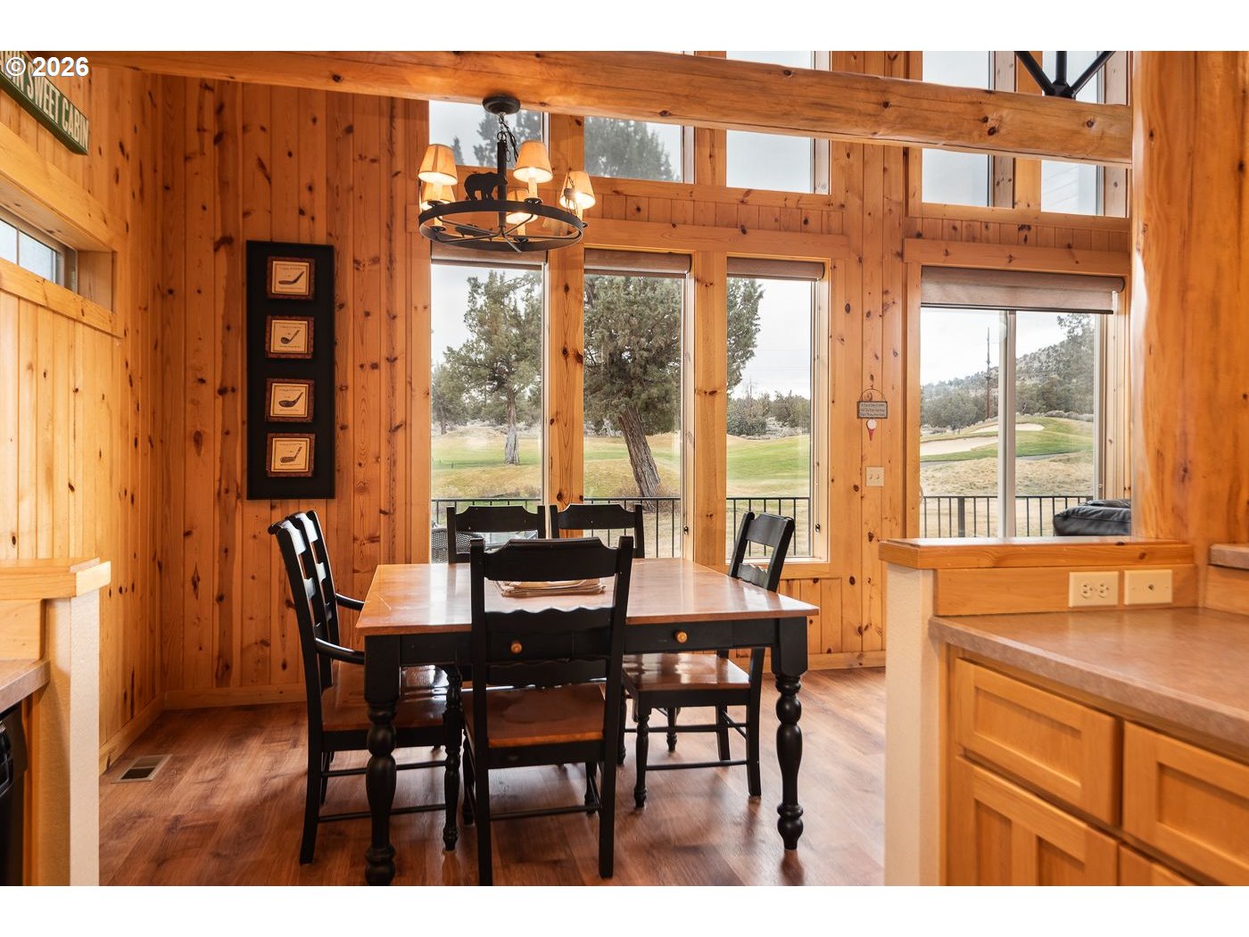 8968 Cliff Swallow Drive Redmond, OR 97756 - Photo 6 of 25 a view of a dining room with furniture window and outside view