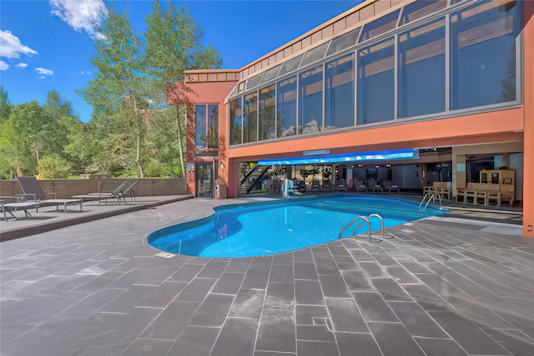 611 Village Road, Unit 21240 Breckenridge, CO 80424 - Photo 14 of 23 a view of a building with a yard