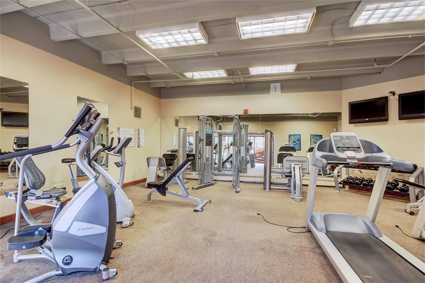 611 Village Road, Unit 21240 Breckenridge, CO 80424 - Photo 17 of 23 a view of a room with gym equipment