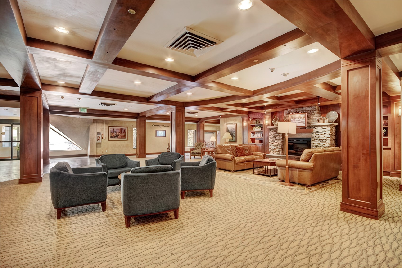 611 Village Road, Unit 21240 Breckenridge, CO 80424 - Photo 21 of 23 a view of a livingroom with furniture and a kitchen view
