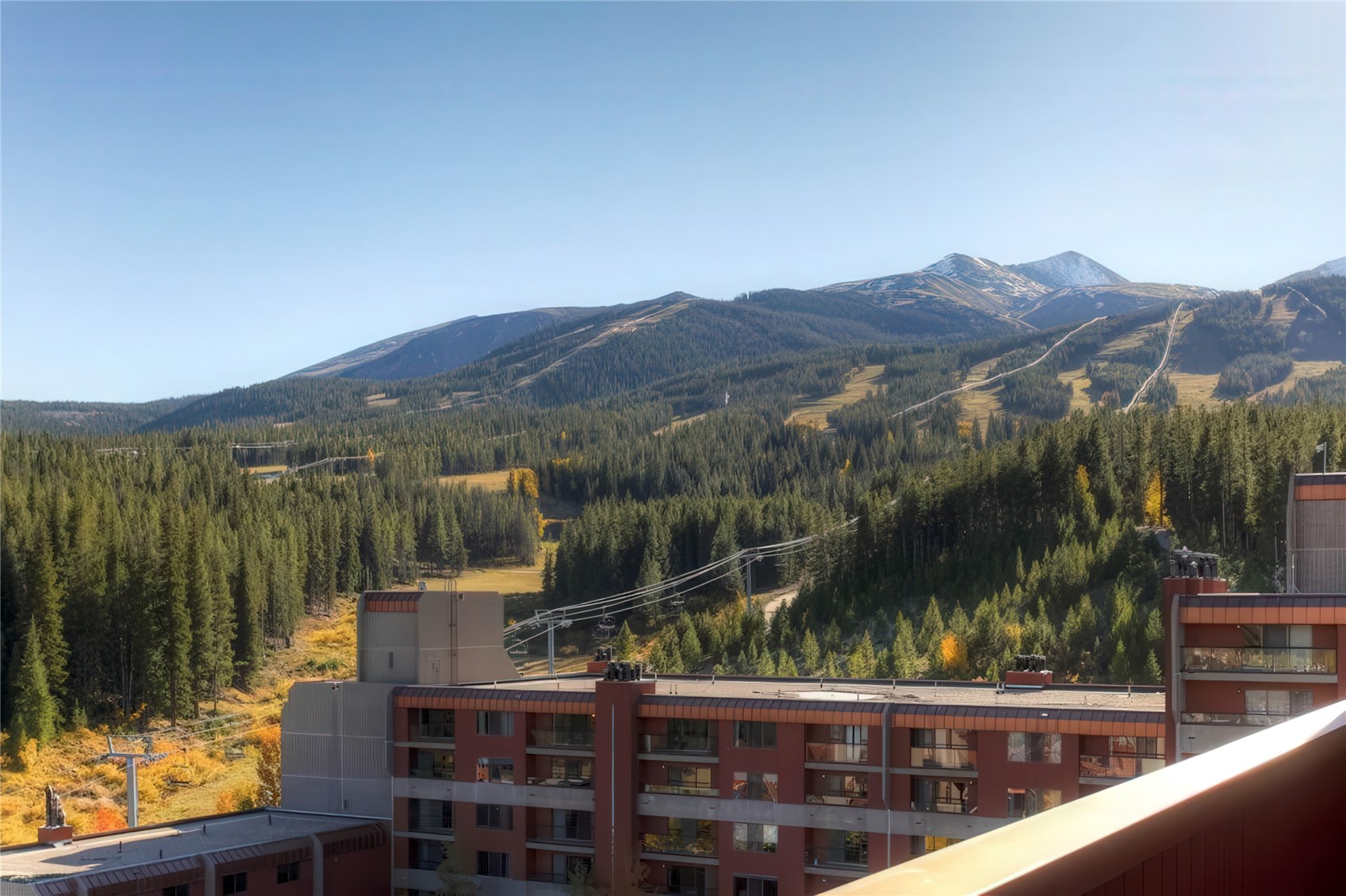 611 Village Road, Unit 21240 Breckenridge, CO 80424 - Photo 22 of 23 a view of a lake from a balcony