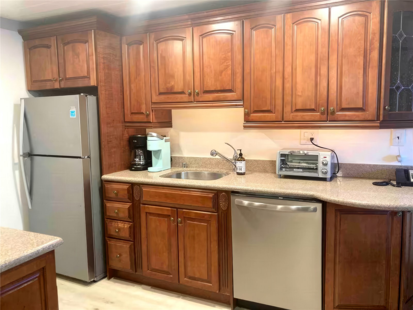 611 Village Road, Unit 21240 Breckenridge, CO 80424 - Photo 4 of 23 a kitchen with stainless steel appliances granite countertop a refrigerator and a sink