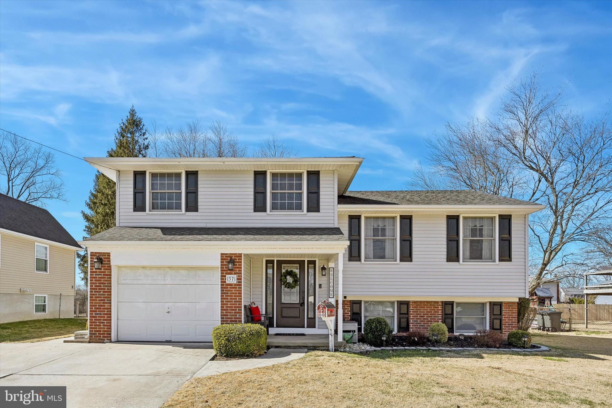 37 Sunnybrook Road Stratford, NJ 08084 - Photo 1 of 26 a front view of a house with a yard