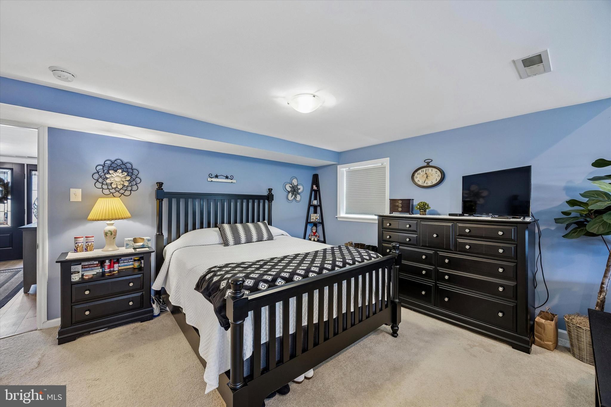 37 Sunnybrook Road Stratford, NJ 08084 - Photo 5 of 26 a bedroom with a bed and a dresser