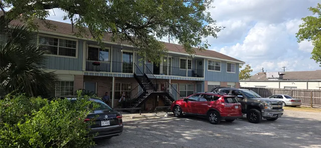 a car parked in front of a house