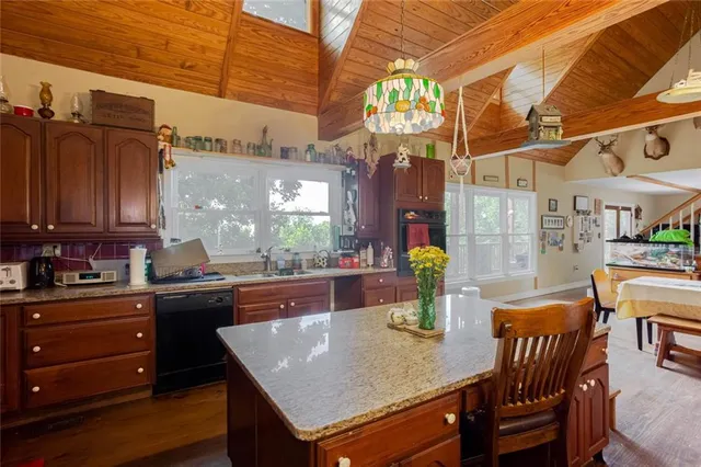 a bathroom with a sink mirror and toilet