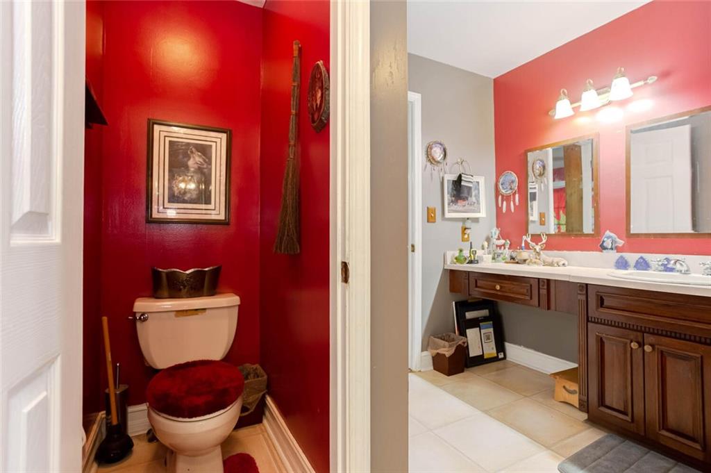8 Mt Sequoyah Road Jasper, GA 30143 - Photo 21 of 86 a bathroom with a sink mirror and toilet