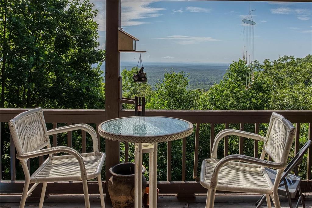8 Mt Sequoyah Road Jasper, GA 30143 - Photo 33 of 86 a view of a chairs and table in the balcony