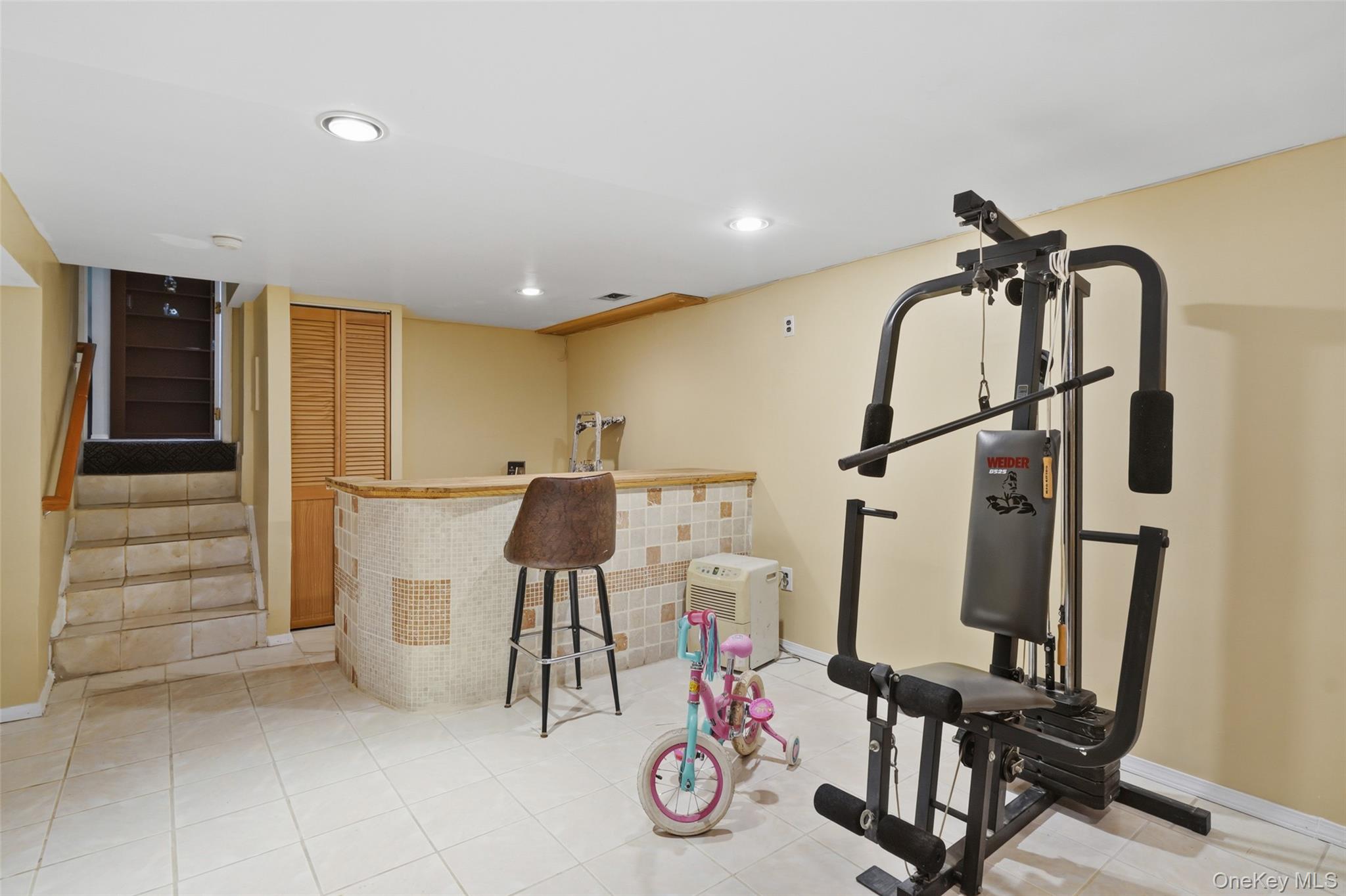 623 Cardinal Road Cortlandt Manor, NY 10567 - Photo 29 of 40 a view of a room with gym equipment