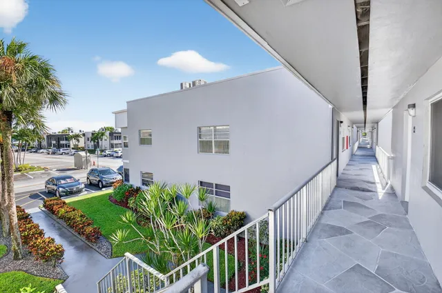 a view of a porch in front of house