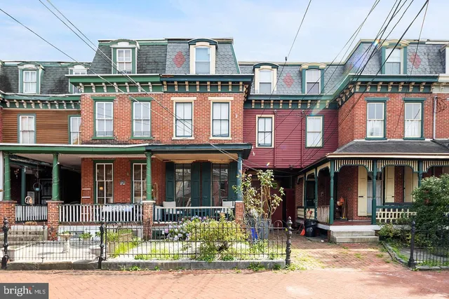 a front view of a multi story residential apartment building