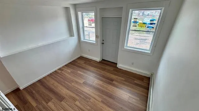 an empty room with windows