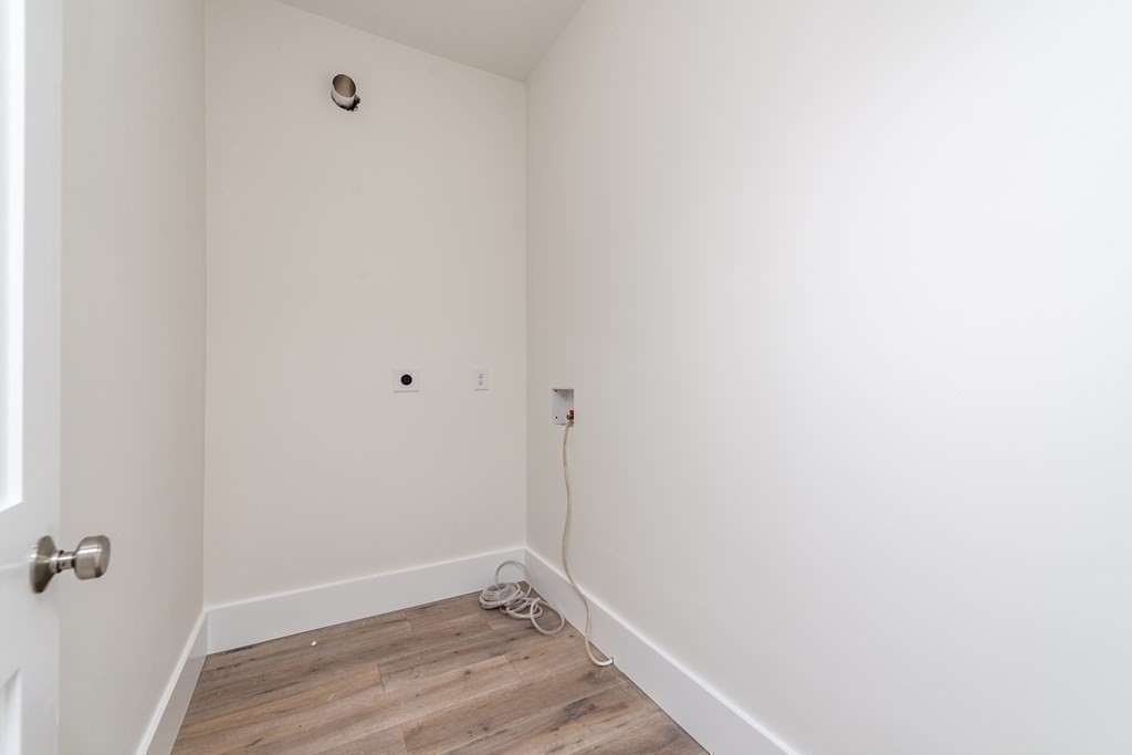 116 School Street, Unit 2 Boston, MA 02119 - Photo 22 of 24 a view of small space with racks on the wall