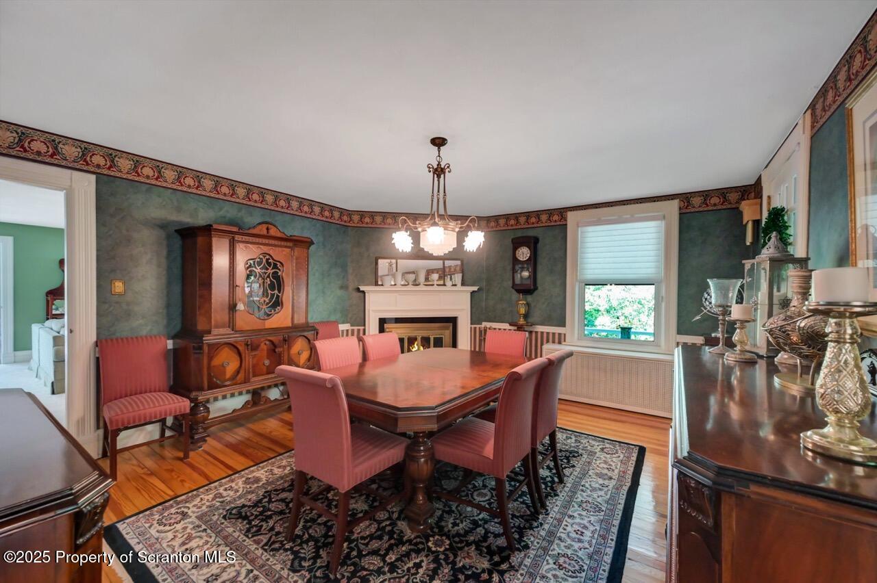 3360 Forest Road Wilkes Barre, PA 18706 - Photo 26 of 88 a view of a dining room with furniture window and wooden floor
