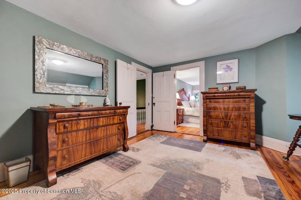 3360 Forest Road Wilkes Barre, PA 18706 - Photo 55 of 88 a room with furniture and wooden floor