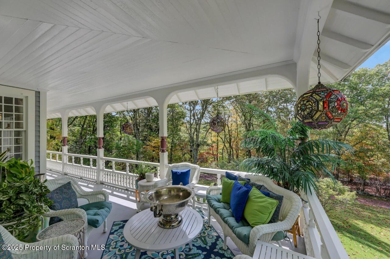 3360 Forest Road Wilkes Barre, PA 18706 - Photo 8 of 88 a living room with furniture and a potted plant