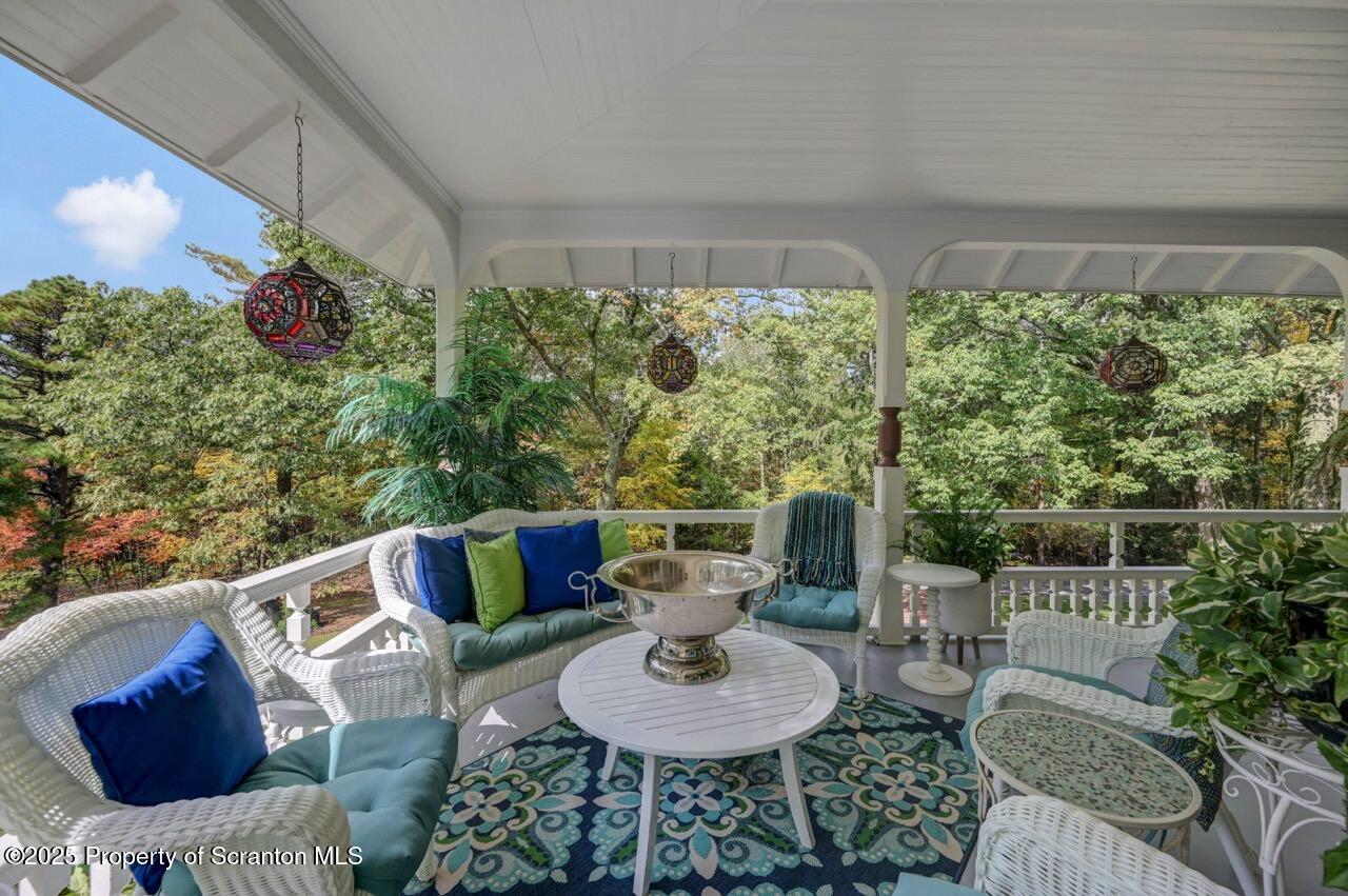3360 Forest Road Wilkes Barre, PA 18706 - Photo 9 of 88 a outdoor living space with furniture and a potted plant