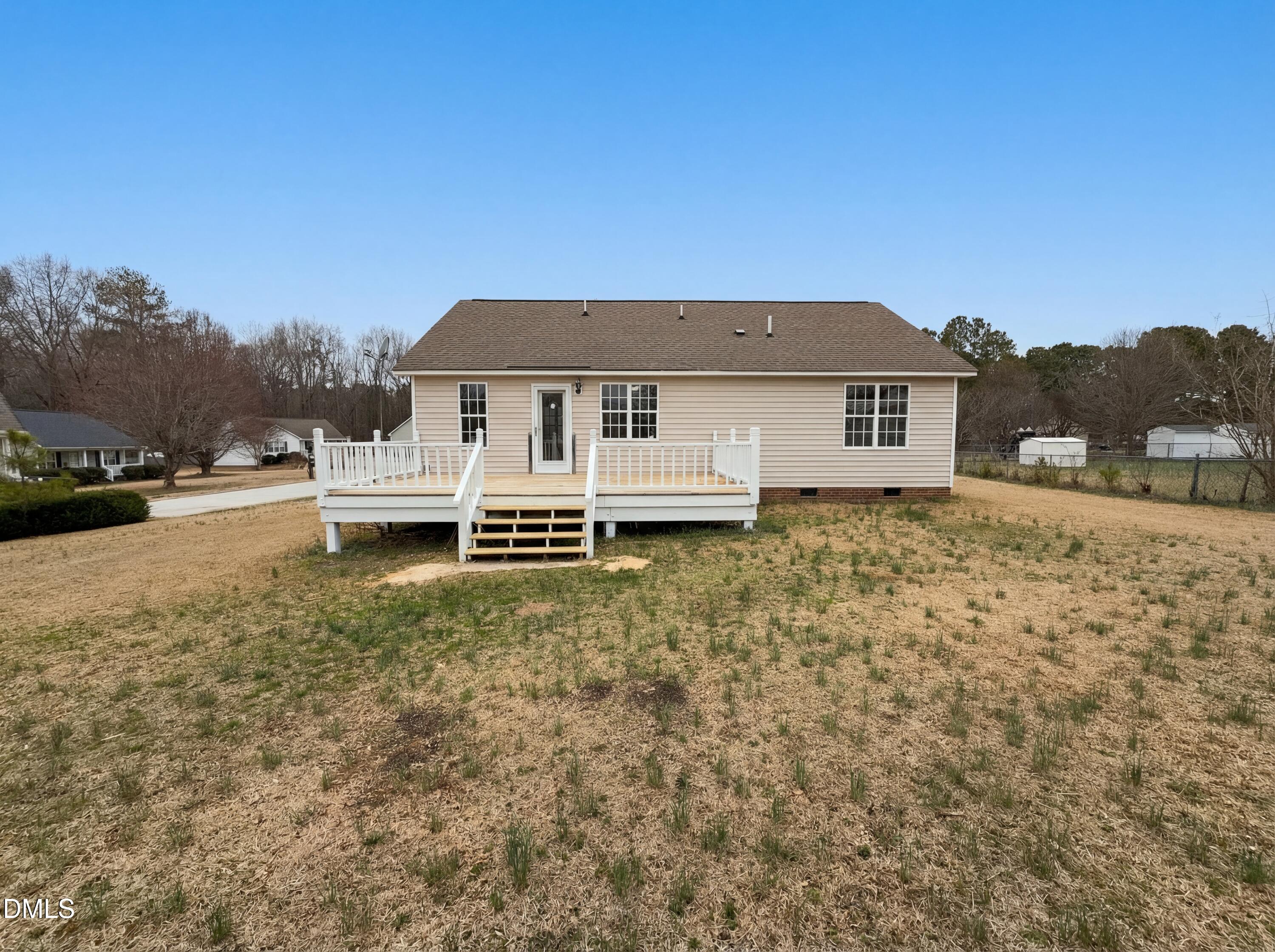 83 Eagle Rock Place Clayton, NC 27520 - Photo 5 of 16 a house view with a garden space
