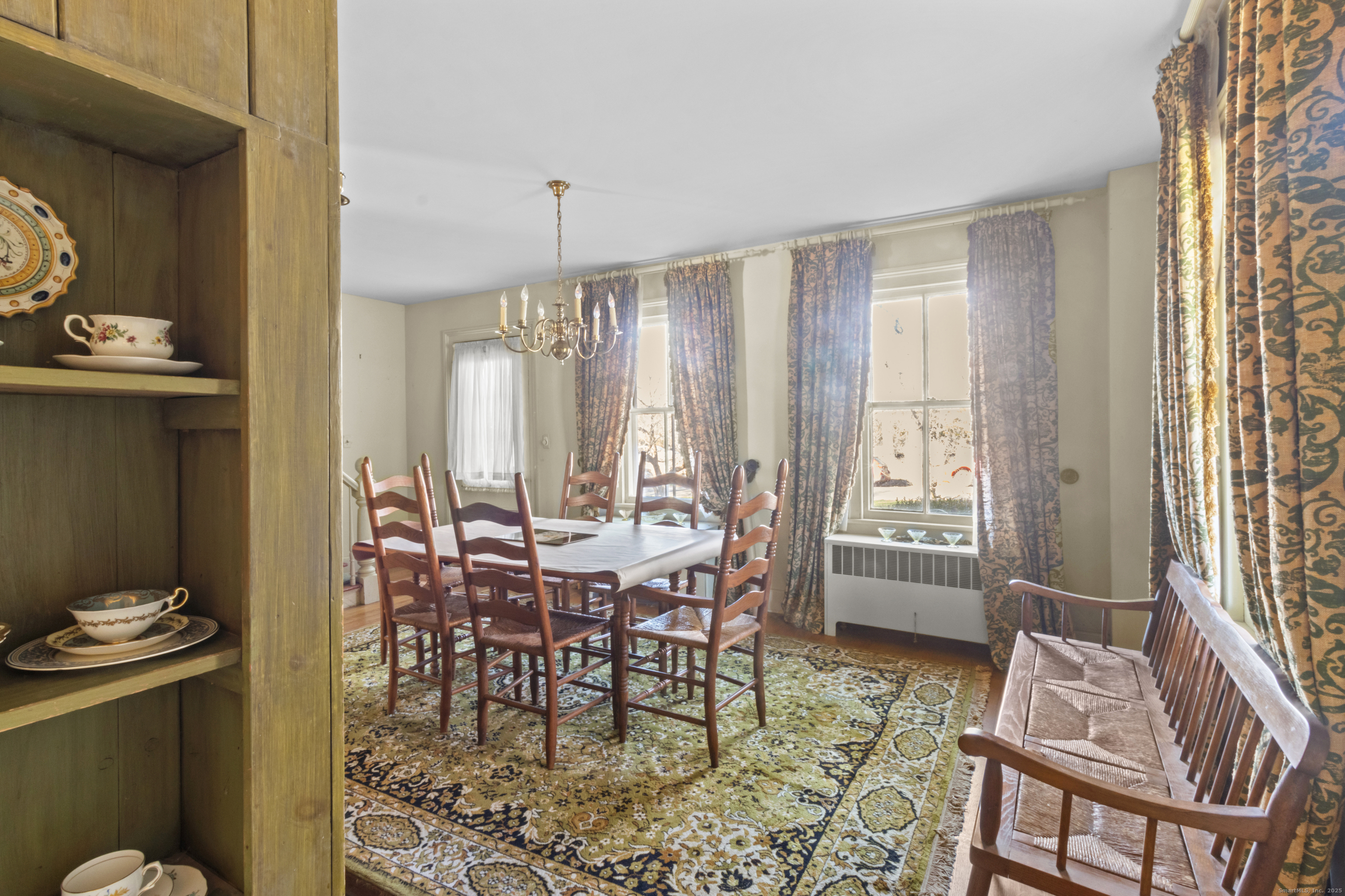 179 Verna Hill Road Fairfield, CT 06824 - Photo 12 of 36 a view of a dining room with furniture window and outside view