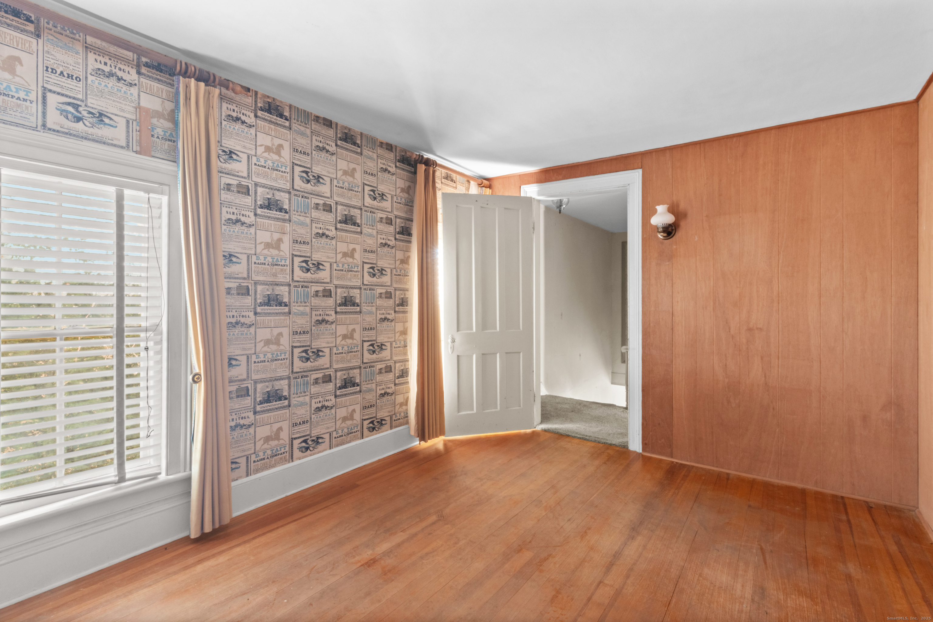 179 Verna Hill Road Fairfield, CT 06824 - Photo 25 of 36 a view of an empty room and window