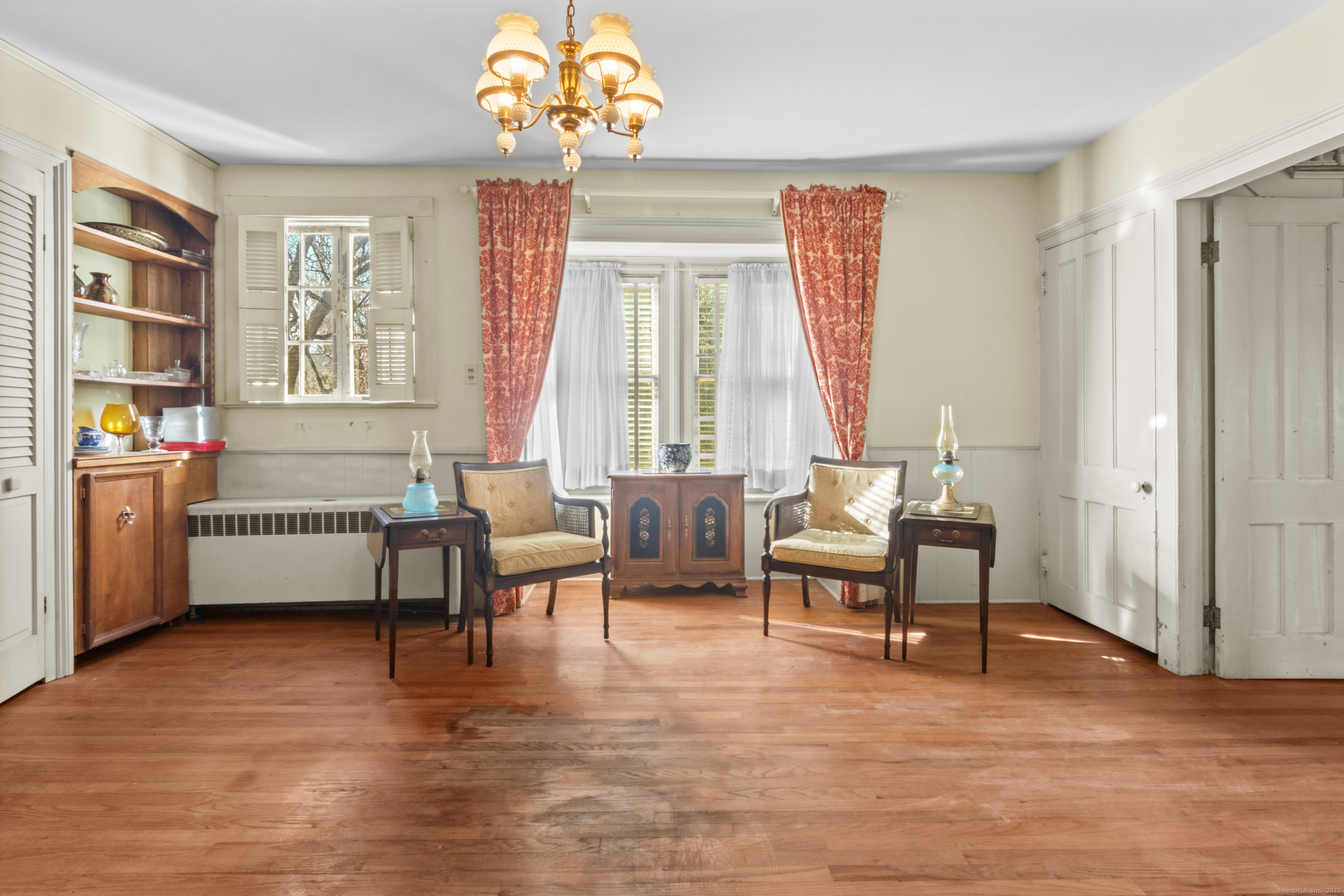 179 Verna Hill Road Fairfield, CT 06824 - Photo 6 of 36 a living room with furniture and a wooden floor