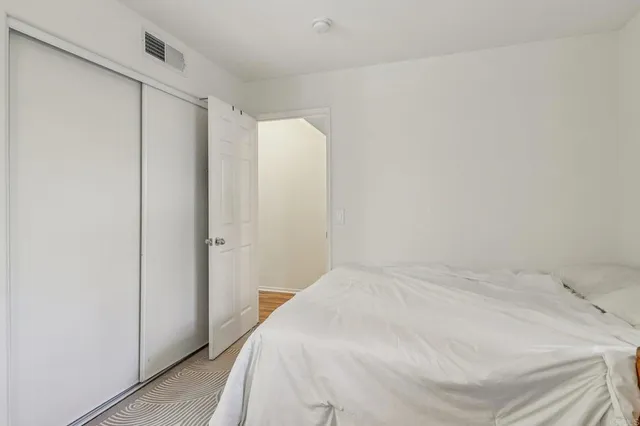a bathroom with a sink toilet and a shower