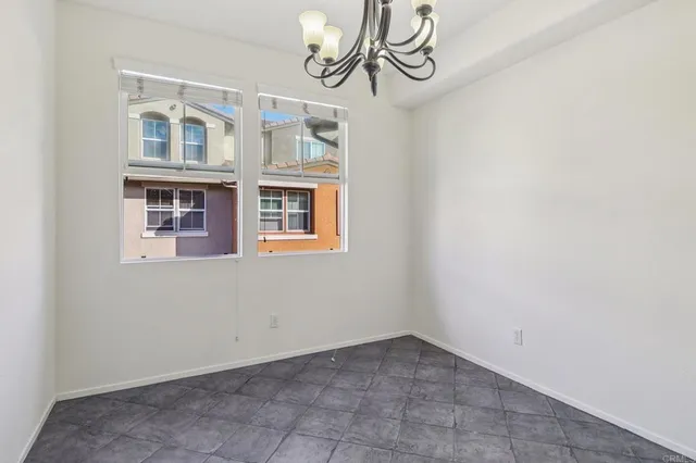 a view of a hallway with seating area