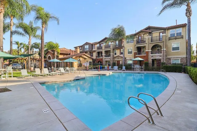 a view of a building with a swimming pool