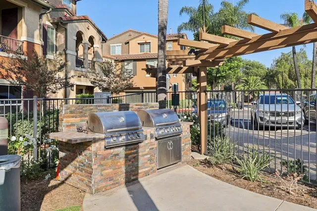 a view of a chairs and table in the patio