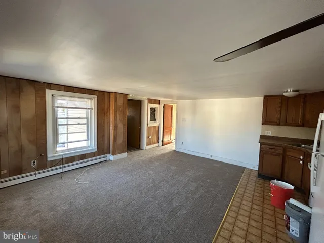 a view of livingroom with hardwood floor and window