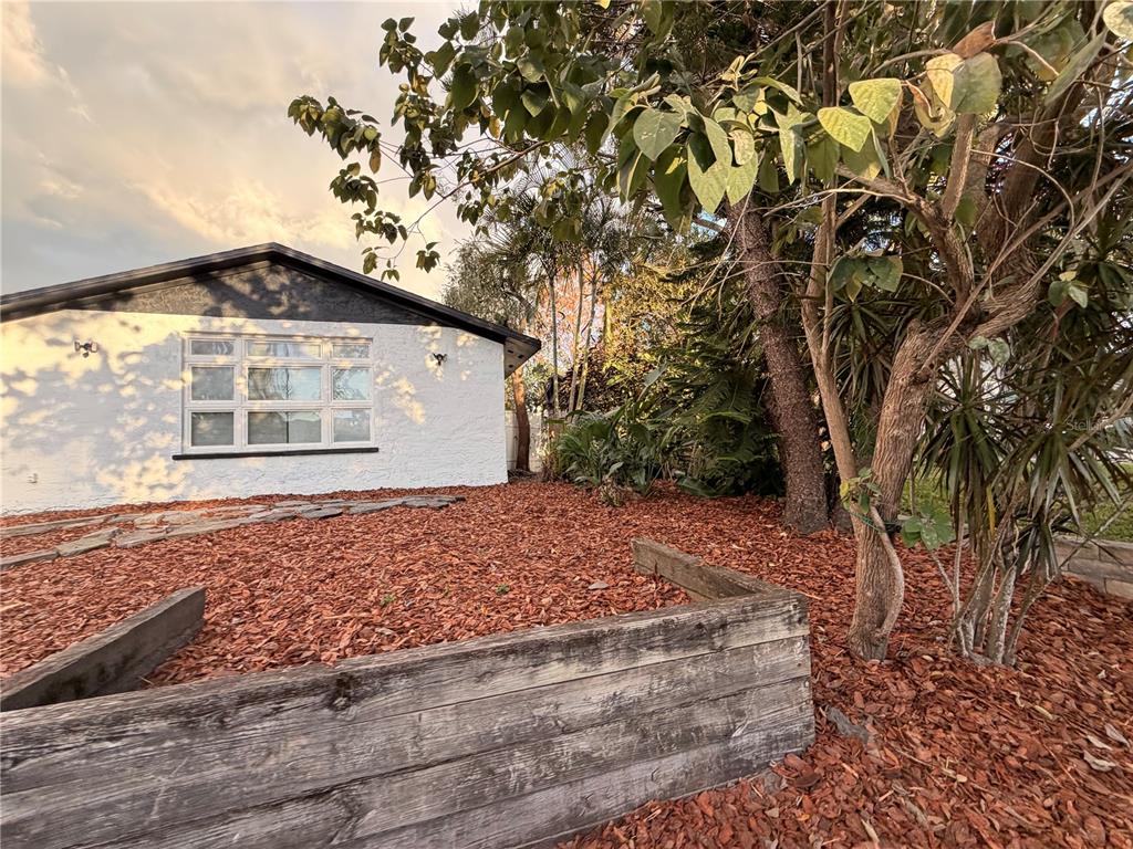 7513 Rustic Drive Tampa, FL 33634 - Photo 3 of 21 a front view of a house with a yard