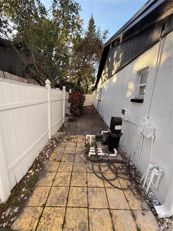 7513 Rustic Drive Tampa, FL 33634 - Photo 4 of 21 a view of outdoor space with seating area