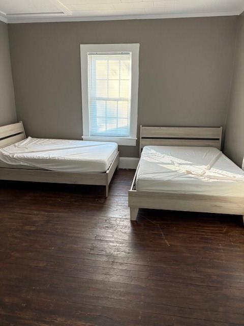 548 Colquitt Street Macon, GA 31206 - Photo 5 of 6 a bedroom with a bed and a window