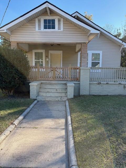 548 Colquitt Street Macon, GA 31206 - Photo 6 of 6 a front view of a house with garden