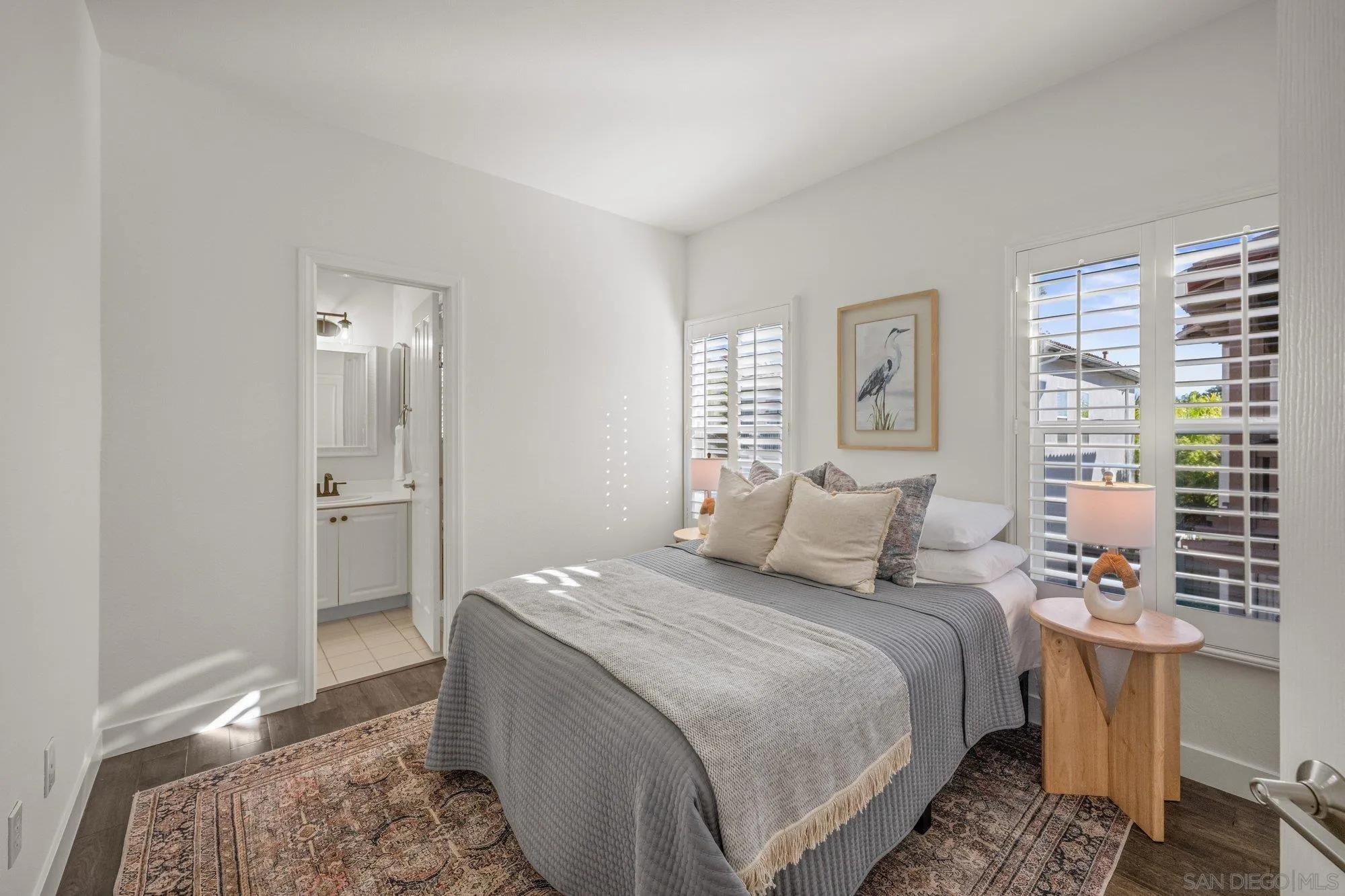 7139 Surfbird Circle Carlsbad, CA 92011 - Photo 18 of 31 a bedroom with a bed and a window