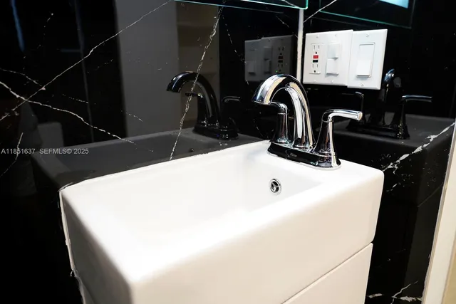 a view of a small space with wooden floor