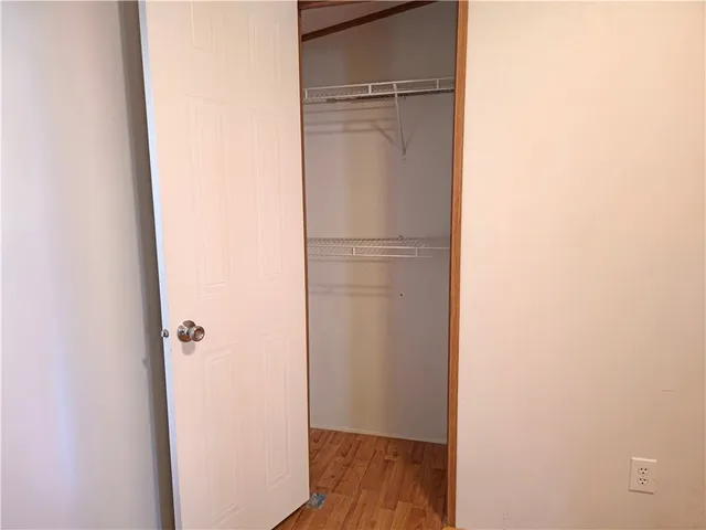 a view of bathroom with wooden floor